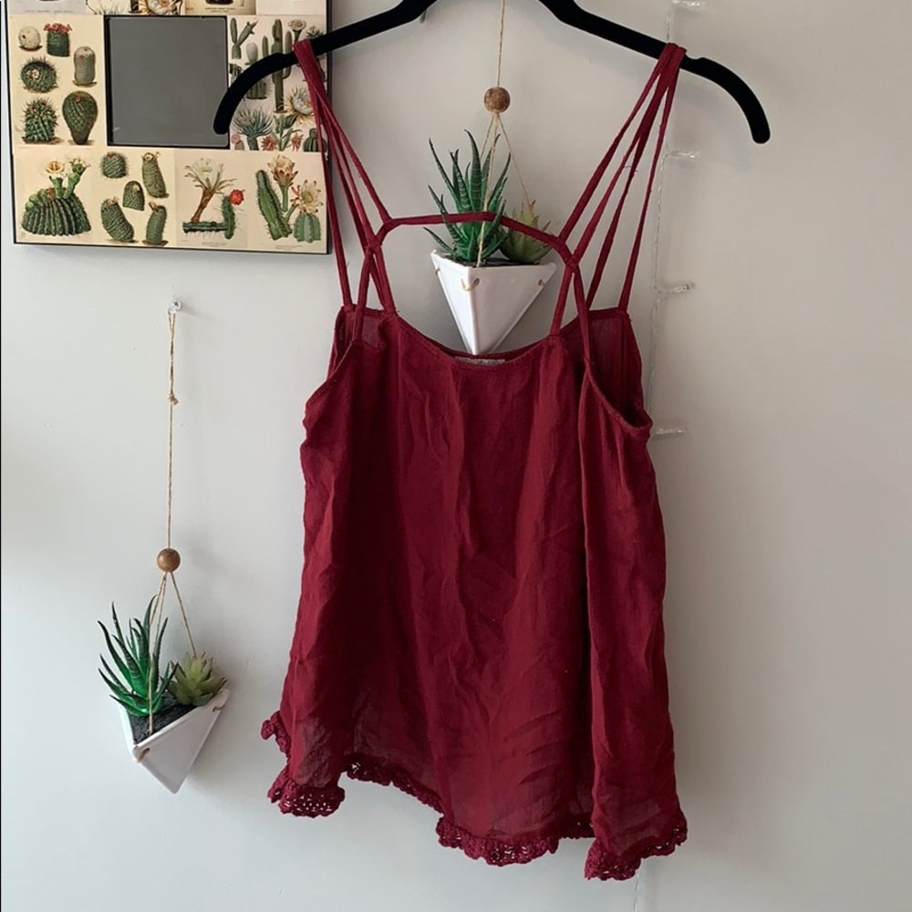red blouse with fun edges.